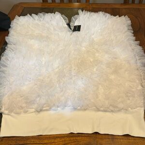 White tule/ netting top with a band at bottom. Size 18/20